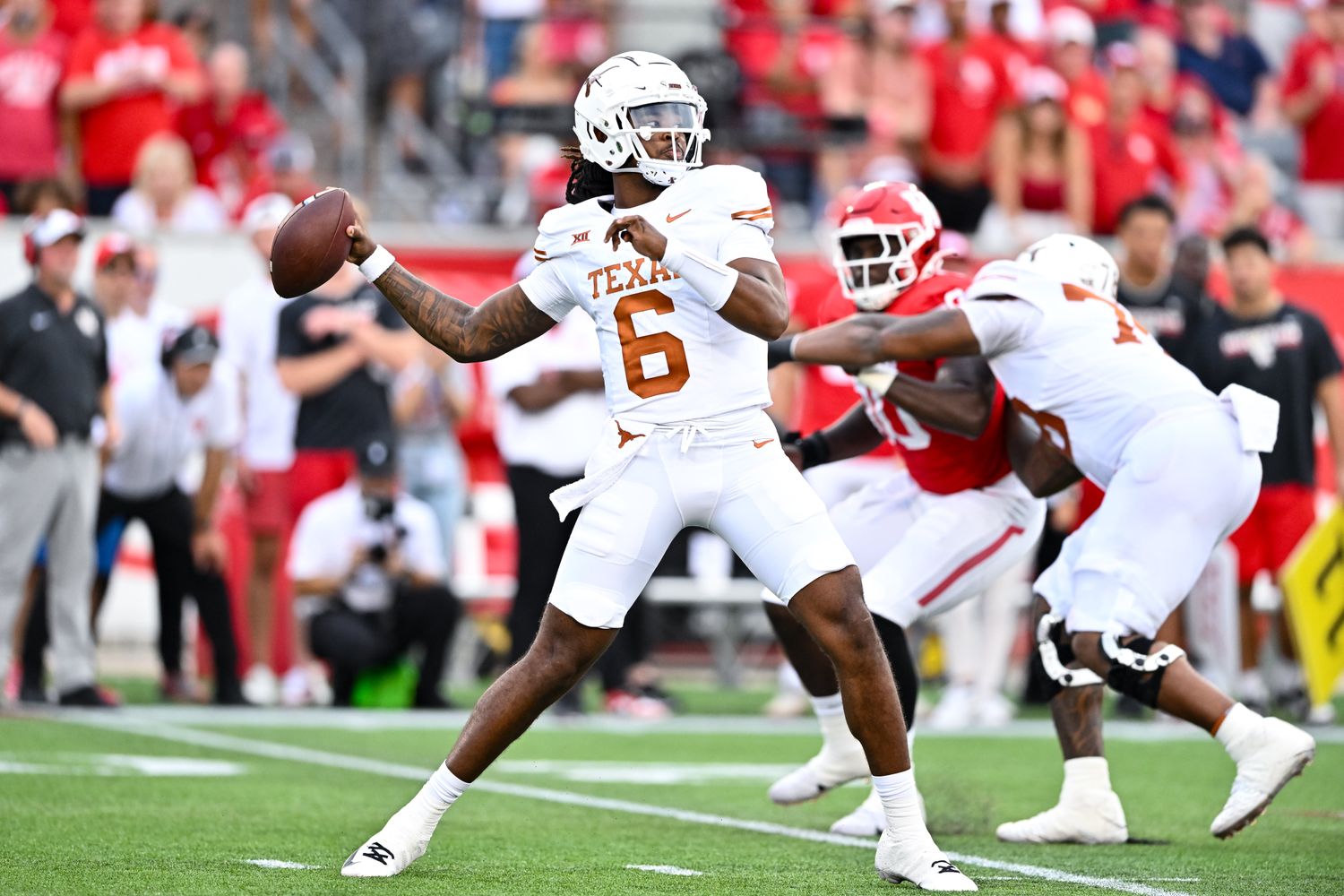 Texas Longhorns quarterback Maalik Murphy (6) looks to pass the ball during the fourth quarter against the Houston Cougars at TDECU Stadium.